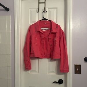 Bright pink destressed jean jacket, detailed back size M